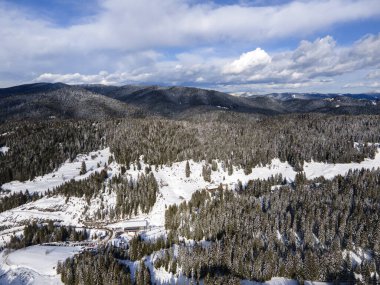 Aerial winter view of Rhodope Mountains around resort of Pamporovo, Smolyan Region, Bulgaria