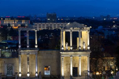 PLOVDIV, BULGARIA -FEBRUARY 24, 2023: Sunset view of Ruins of Ancient Roman theatre of Philippopolis in city of Plovdiv, Bulgaria