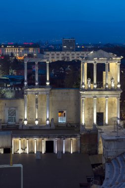 PLOVDIV, BULGARIA -FEBRUARY 24, 2023: Sunset view of Ruins of Ancient Roman theatre of Philippopolis in city of Plovdiv, Bulgaria