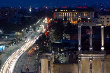 PLOVDIV, BULGARIA -FEBRUARY 24, 2023: Sunset view of Ruins of Ancient Roman theatre of Philippopolis in city of Plovdiv, Bulgaria