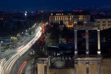 PLOVDIV, BULGARIA -FEBRUARY 24, 2023: Sunset view of Ruins of Ancient Roman theatre of Philippopolis in city of Plovdiv, Bulgaria