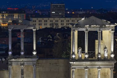 PLOVDIV, BULGARIA -FEBRUARY 24, 2023: Sunset view of Ruins of Ancient Roman theatre of Philippopolis in city of Plovdiv, Bulgaria