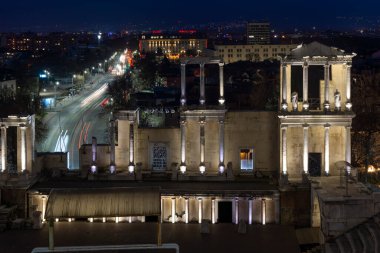 PLOVDIV, BULGARIA -FEBRUARY 24, 2023: Sunset view of Ruins of Ancient Roman theatre of Philippopolis in city of Plovdiv, Bulgaria