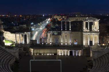 PLOVDIV, BULGARIA -FEBRUARY 24, 2023: Sunset view of Ruins of Ancient Roman theatre of Philippopolis in city of Plovdiv, Bulgaria