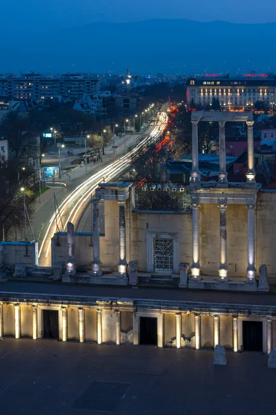 PLOVDIV, BULGARIA -FEBRUARY 24, 2023: Sunset view of Ruins of Ancient Roman theatre of Philippopolis in city of Plovdiv, Bulgaria