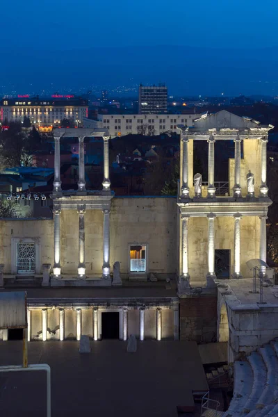 PLOVDIV, BULGARIA -FEBRUARY 24, 2023: Sunset view of Ruins of Ancient Roman theatre of Philippopolis in city of Plovdiv, Bulgaria