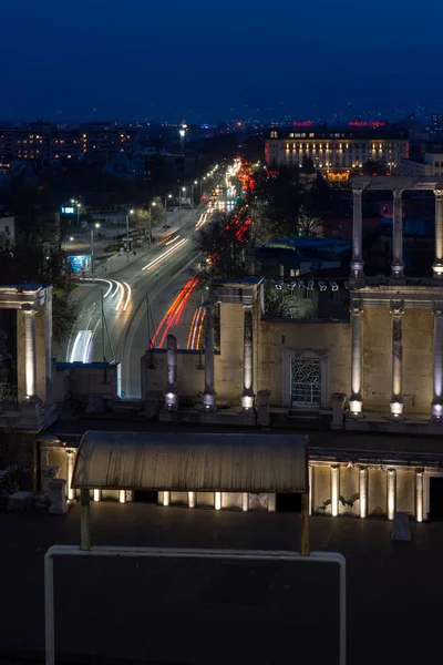 PLOVDIV, BULGARIA -FEBRUARY 24, 2023: Sunset view of Ruins of Ancient Roman theatre of Philippopolis in city of Plovdiv, Bulgaria