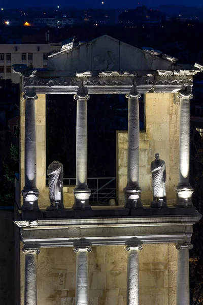 PLOVDIV, BULGARIA -FEBRUARY 24, 2023: Sunset view of Ruins of Ancient Roman theatre of Philippopolis in city of Plovdiv, Bulgaria