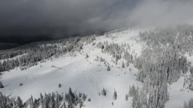 Amazing Aerial winter view of Rila mountain near Belmeken Dam, Bulgaria