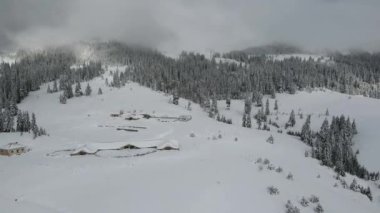 Amazing Aerial winter view of Rila mountain near Belmeken Dam, Bulgaria