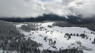 Amazing Aerial winter view of Rila mountain near Belmeken Dam, Bulgaria