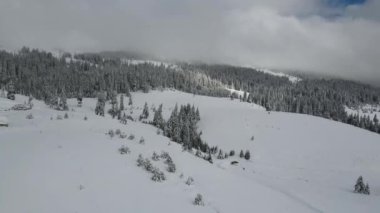 Amazing Aerial winter view of Rila mountain near Belmeken Dam, Bulgaria