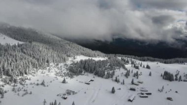 Amazing Aerial winter view of Rila mountain near Belmeken Dam, Bulgaria