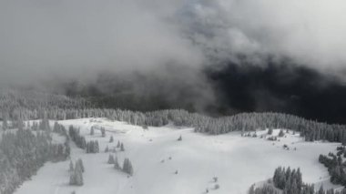 Amazing Aerial winter view of Rila mountain near Belmeken Dam, Bulgaria