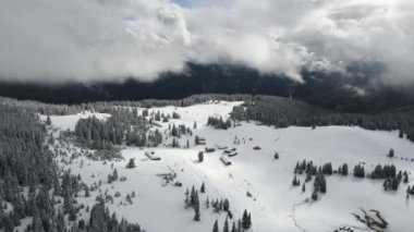Amazing Aerial winter view of Rila mountain near Belmeken Dam, Bulgaria