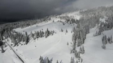 Amazing Aerial winter view of Rila mountain near Belmeken Dam, Bulgaria