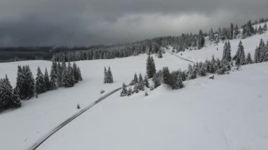 Amazing Aerial winter view of Rila mountain near Belmeken Dam, Bulgaria