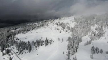 Amazing Aerial winter view of Rila mountain near Belmeken Dam, Bulgaria