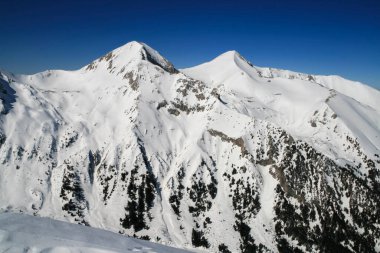 Bulgaristan 'ın Todorka tepesinden Pirin Dağı' nın muhteşem kış manzarası