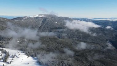 Amazing Aerial winter view of Rila mountain near Belmeken Dam, Bulgaria