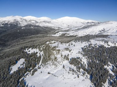 Amazing Aerial winter view of Rila mountain near Belmeken Dam, Bulgaria