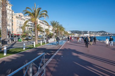 GÜZEL, FRANCE - 25 HAZİRAN 2024: Nice, Provence Alpes-Cote d 'Azur, Fransa' nın sahil caddesinin günbatımı Panoraması