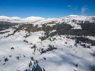 Amazing Aerial winter view of Rila mountain near Belmeken Dam, Bulgaria