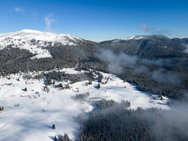 Amazing Aerial winter view of Rila mountain near Belmeken Dam, Bulgaria