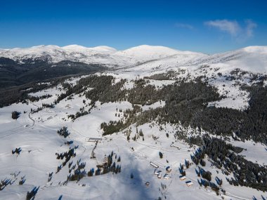 Amazing Aerial winter view of Rila mountain near Belmeken Dam, Bulgaria