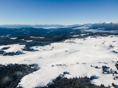Amazing Aerial winter view of Rila mountain near Belmeken Dam, Bulgaria