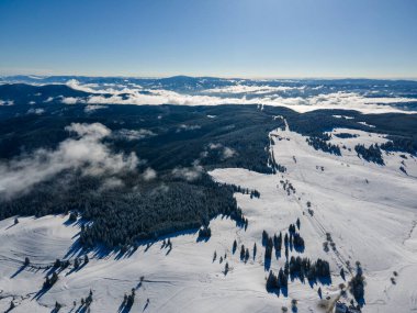 Amazing Aerial winter view of Rila mountain near Belmeken Dam, Bulgaria