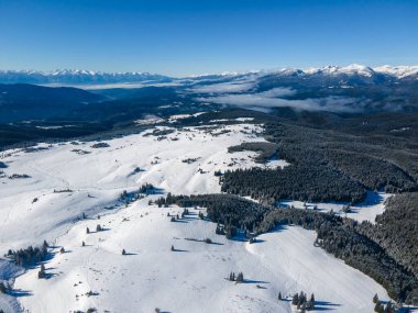 Amazing Aerial winter view of Rila mountain near Belmeken Dam, Bulgaria