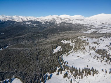 Amazing Aerial winter view of Rila mountain near Belmeken Dam, Bulgaria
