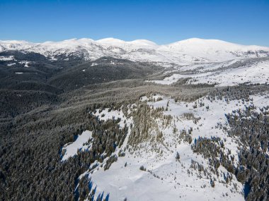 Amazing Aerial winter view of Rila mountain near Belmeken Dam, Bulgaria