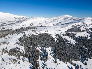 Amazing Aerial winter view of Rila mountain near Belmeken Dam, Bulgaria