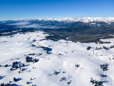 Amazing Aerial winter view of Rila mountain near Belmeken Dam, Bulgaria