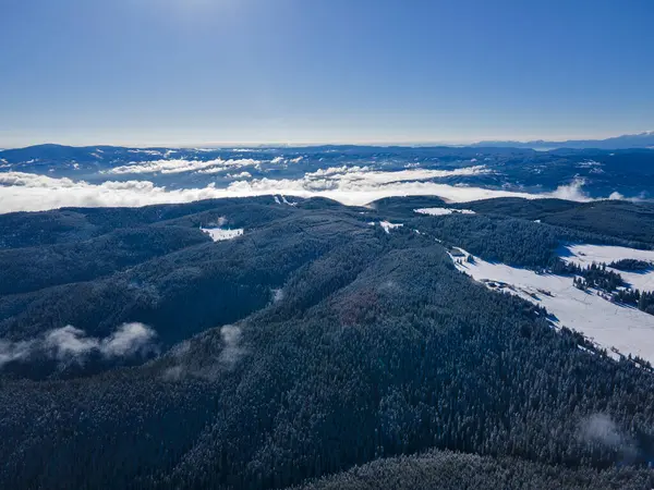 Amazing Aerial winter view of Rila mountain near Belmeken Dam, Bulgaria