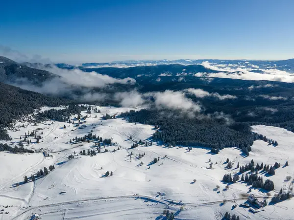 Amazing Aerial winter view of Rila mountain near Belmeken Dam, Bulgaria