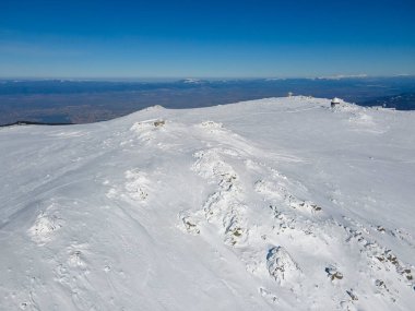 Aerial Winter view of Vitosha Mountain near Cherni Vrah peak, Sofia City Region, Bulgaria clipart