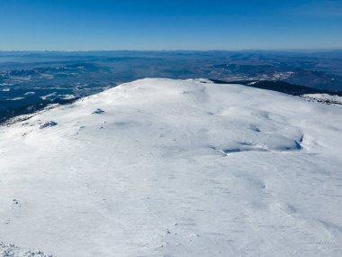 Aerial Winter view of Vitosha Mountain near Cherni Vrah peak, Sofia City Region, Bulgaria clipart