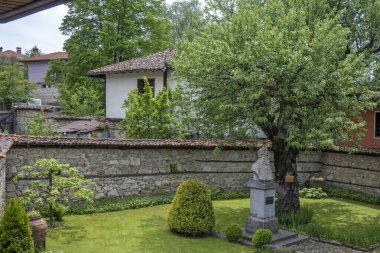 KOPRIVSHTITSA, BULGARIA - JUNE 2, 2023: Typical Street and old houses at historical town of Koprivshtitsa, Sofia Region, Bulgaria clipart