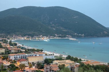 VASILIKI, LEFKADA, GREECE - AUGUST 25, 2023: Summer Panorama of village of Vasiliki at Lefkada, Ionian Islands, Greece clipart