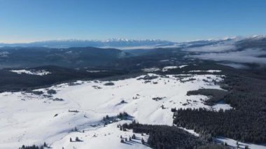 Amazing Aerial winter view of Rila mountain near Belmeken Dam, Bulgaria
