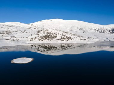 Amazing Aerial winter view of Rila mountain near Belmeken Dam, Bulgaria