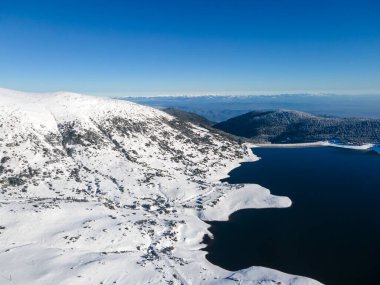Amazing Aerial winter view of Rila mountain near Belmeken Dam, Bulgaria