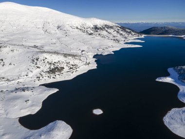 Amazing Aerial winter view of Rila mountain near Belmeken Dam, Bulgaria