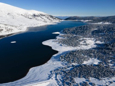 Amazing Aerial winter view of Rila mountain near Belmeken Dam, Bulgaria
