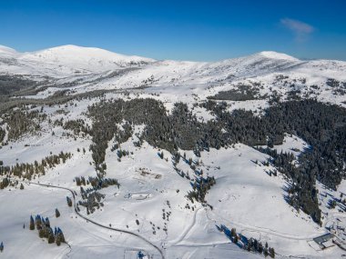 Amazing Aerial winter view of Rila mountain near Belmeken Dam, Bulgaria