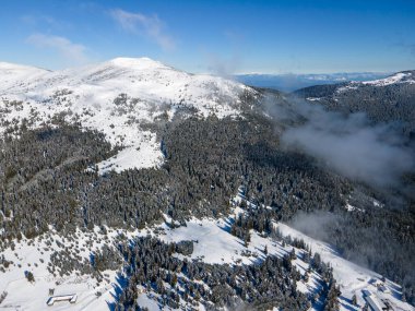 Amazing Aerial winter view of Rila mountain near Belmeken Dam, Bulgaria