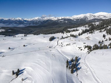Amazing Aerial winter view of Rila mountain near Belmeken Dam, Bulgaria